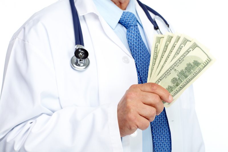 Hands of medical doctor. Healthcare blue background.